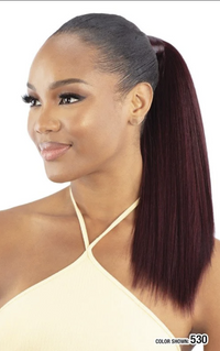 Thumbnail for Woman with a ponytail wearing a beige top on a white background