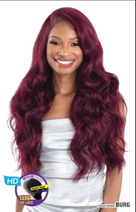 Woman with burgundy wig on a white background