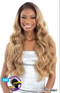 Thumbnail for Woman with long blonde wig on a white background