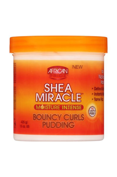 A container of African Pride Shea Butter Bouncy Curls Pudding with an orange lid and label.