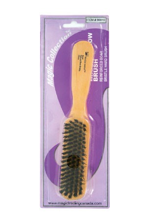 A hairbrush from the MAGIC GOLD COLLECTION, packaged in a clear plastic blister pack with a purple and white design.